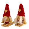 Gnom mit Ski aus Holz mit roter Stoffmütze, 2 ass. 9x5cm